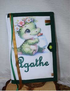 Protège carnet de santé bébé brodé avec texte ou prénom.