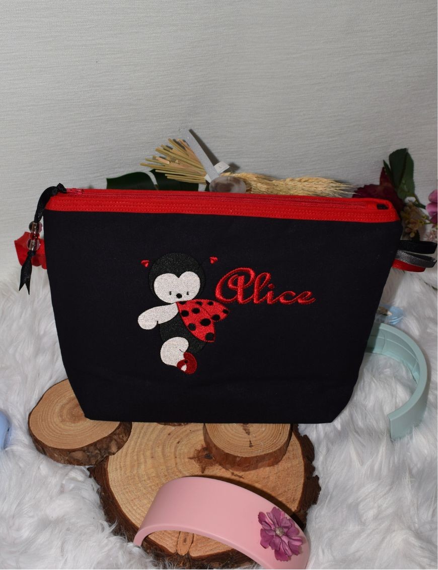 Trousse de toilette personnalisée COCCINELLE